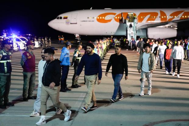 Venezuelan migrants deported from the United States arrive at Simon Bolivar International Airport in Maiquetia, Venezuela, Monday, March 24, 2025. (AP Photo/Ariana Cubillos)