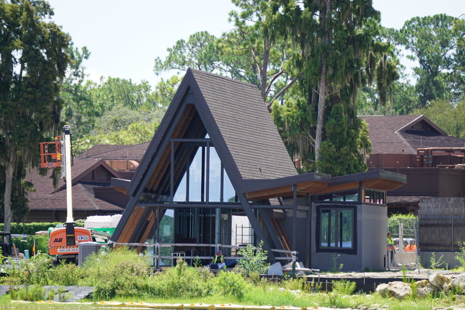 A new bridge, additional tree murals, and dark green tower finishes are among the latest additions to Disney Lakeshore Lodge.