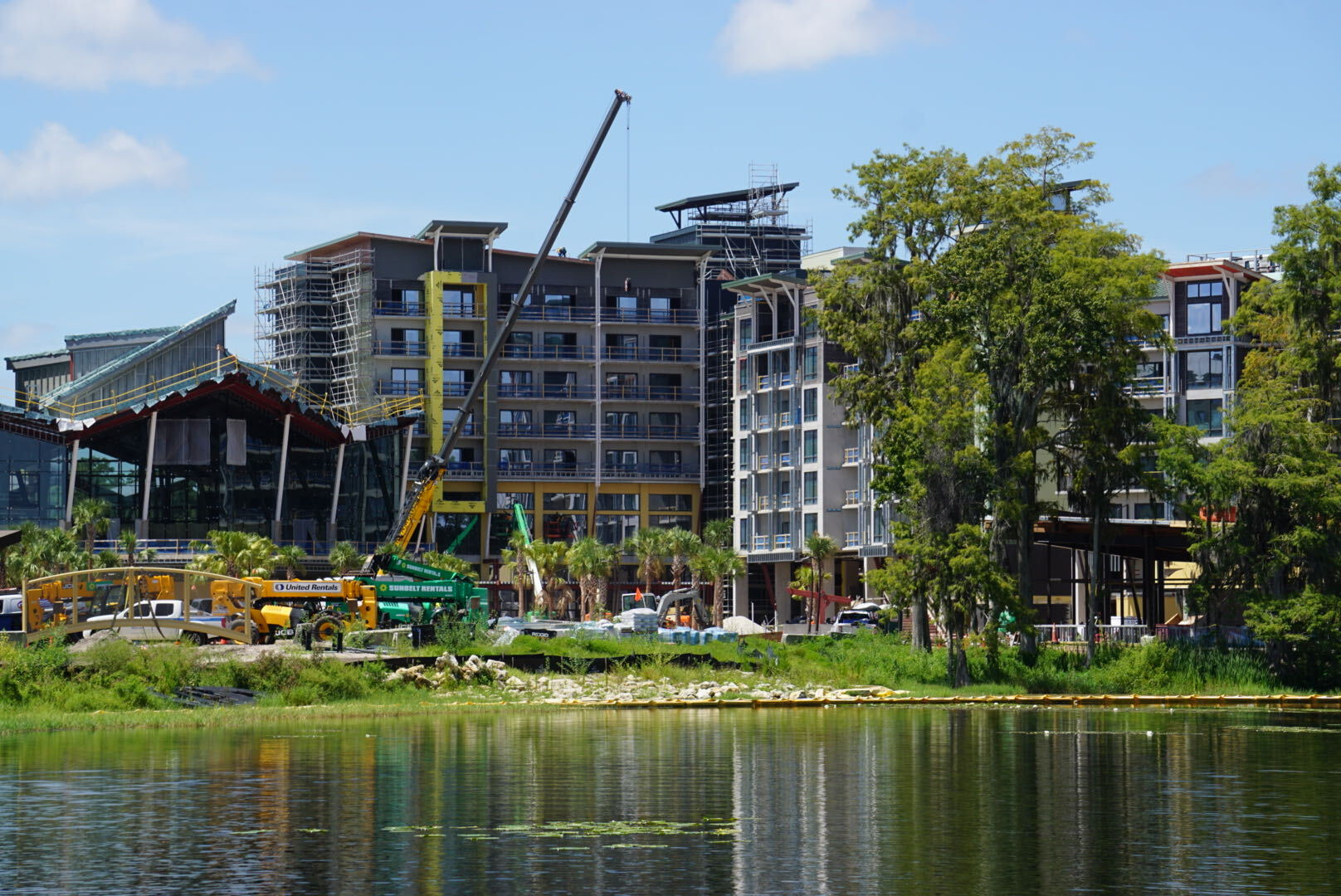 A new bridge, additional tree murals, and dark green tower finishes are among the latest additions to Disney Lakeshore Lodge.