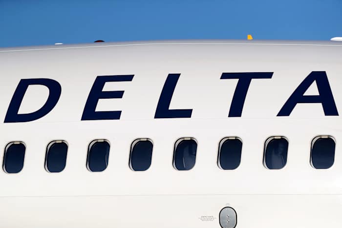 Delta flight bound for Orlando evacuated after reports of smoke