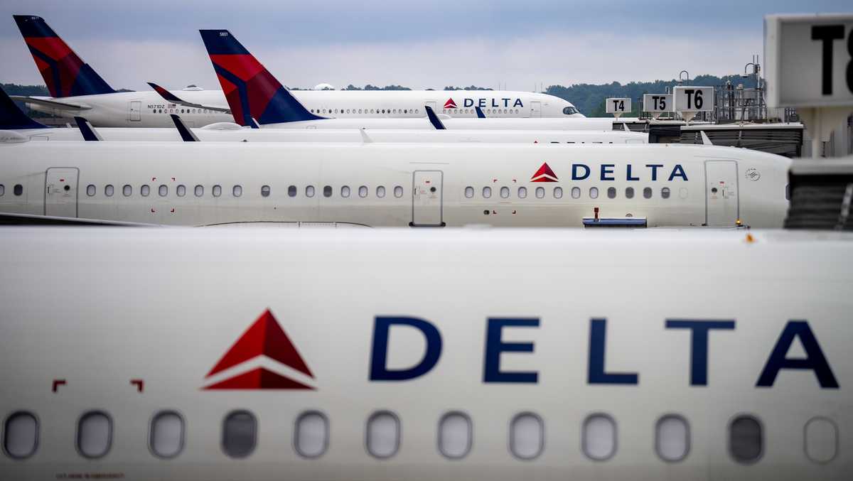 Passengers evacuated after Delta flight to Orlando returns to Atlanta due to report of fumes in the flight deck, airline says