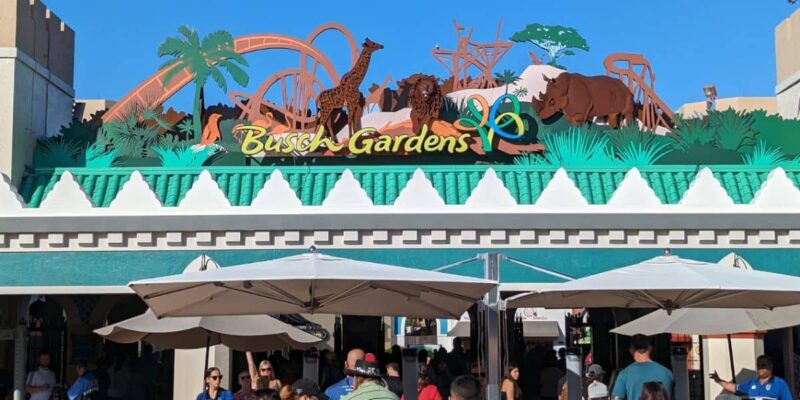 Guests walk into the entrance of Busch Gardens Tampa Bay