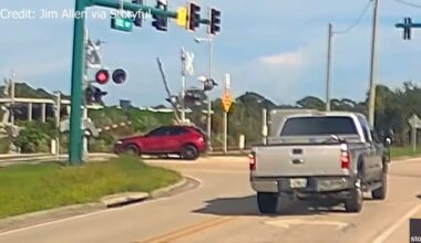 Video: Man saves woman trapped on Florida train tracks with seconds to spare