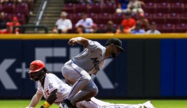 Marlins score seven in final innings to top Reds