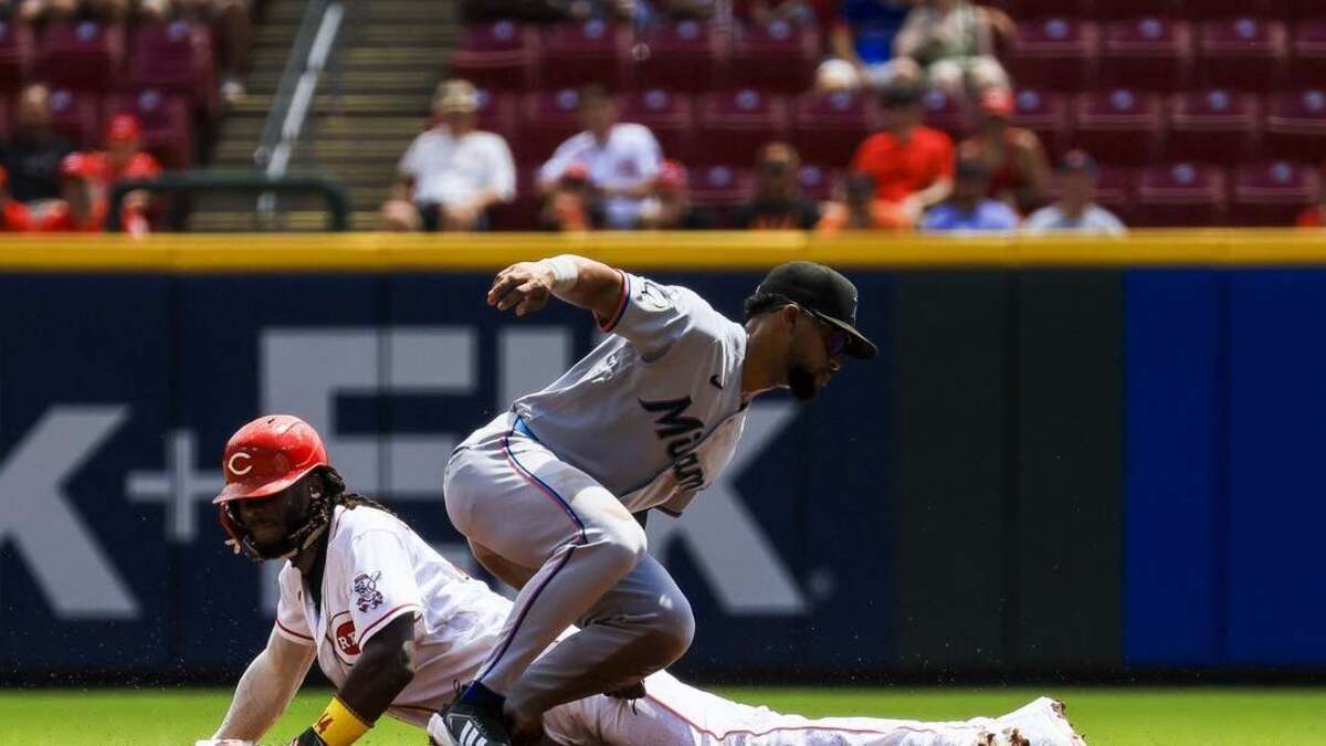 Marlins score seven in final innings to top Reds