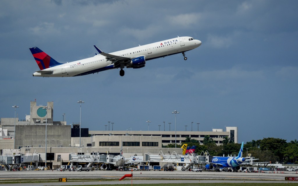 A Delta Airlines jet takes off at Palm Beach International Airport.