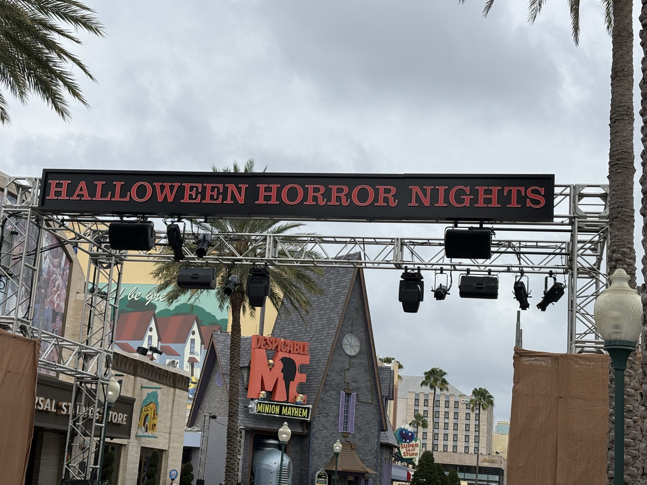 Guests will now see the black-and-red Halloween Horror Nights sign at the front of the park. It is hung on a truss with speakers and stage lights. This will act as the entrance to the event.