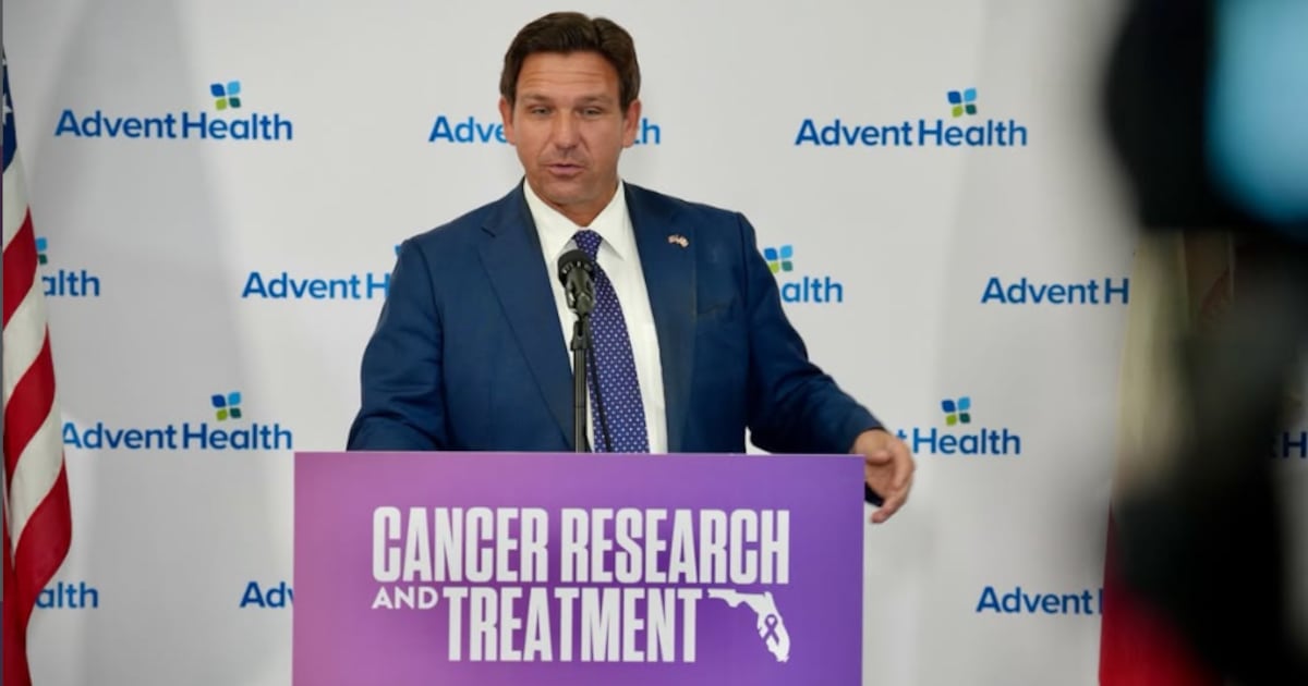 The governor visited Orlando on Wednesday as the hospital announced increased investments in cancer