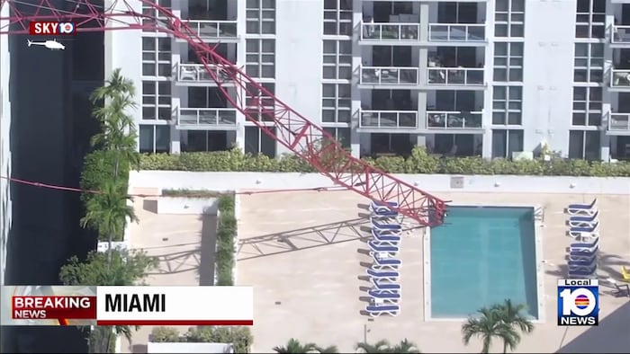 Crane top falls into pool at Miami construction site