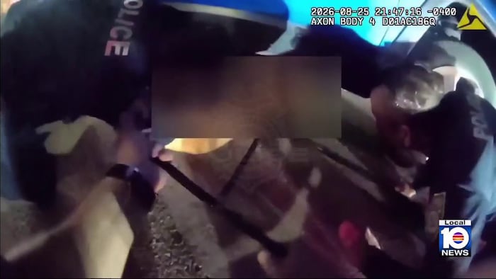 Video shows Miami Beach cops rescue woman who was pinned under SUV after crash