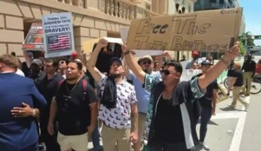 Tate Brothers' Supporters Protest Outside Miami Jail, Call for Their Release