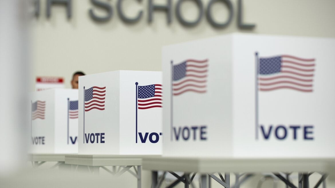 A voter in a high school polling location during the 2024 presidential election.