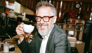 man holding coffee cup