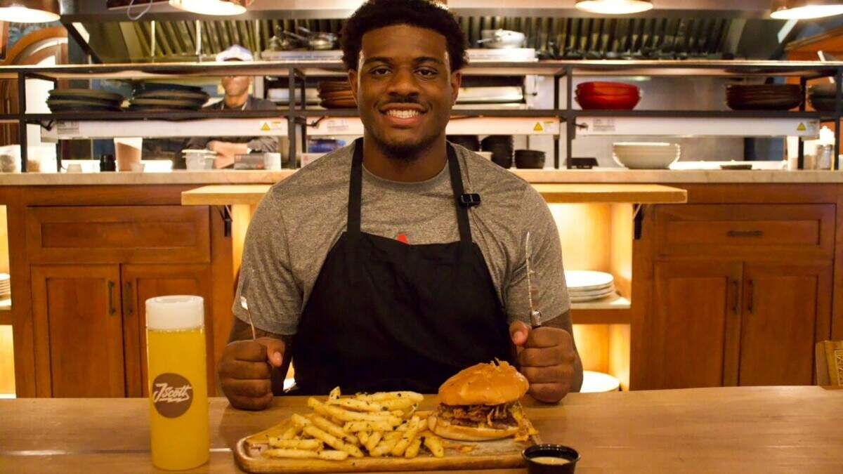 Miami Hurricane player gets a burger at popular Overtown food spot