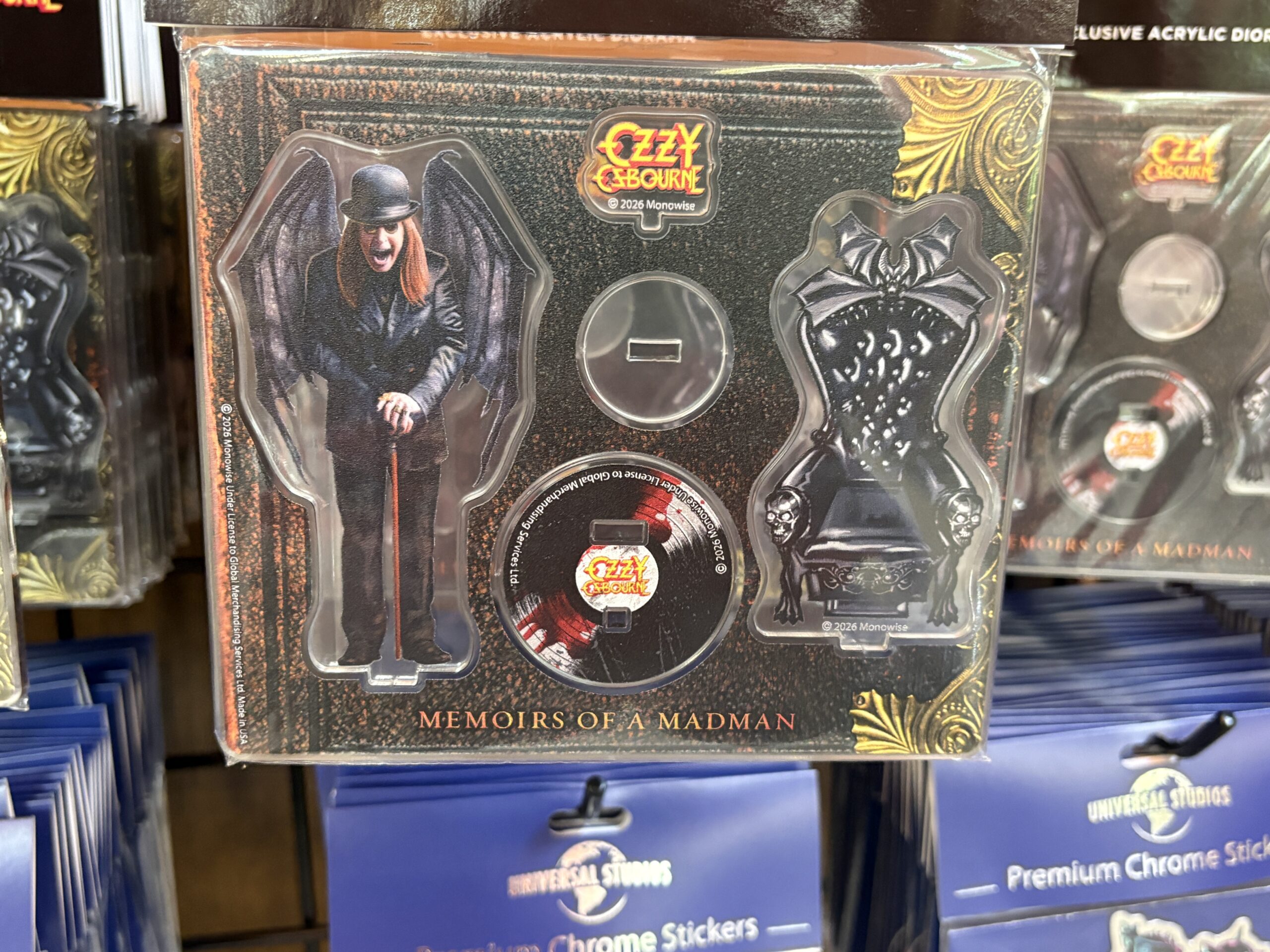 Ozzy is also available as an acrylic figure set. This set comes with a base that is Ozzy's "Memoirs of a Madman" album, his batty throne, his name, and the man himself.
