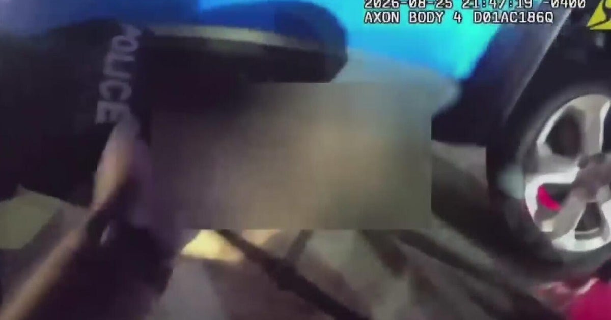 Body cam footage shows Miami Beach officers lifting SUV to rescue woman trapped after scooter crash