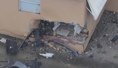 Car crashes into Miami-Dade apartment building, leaving gaping hole and structure deemed uninhabitable