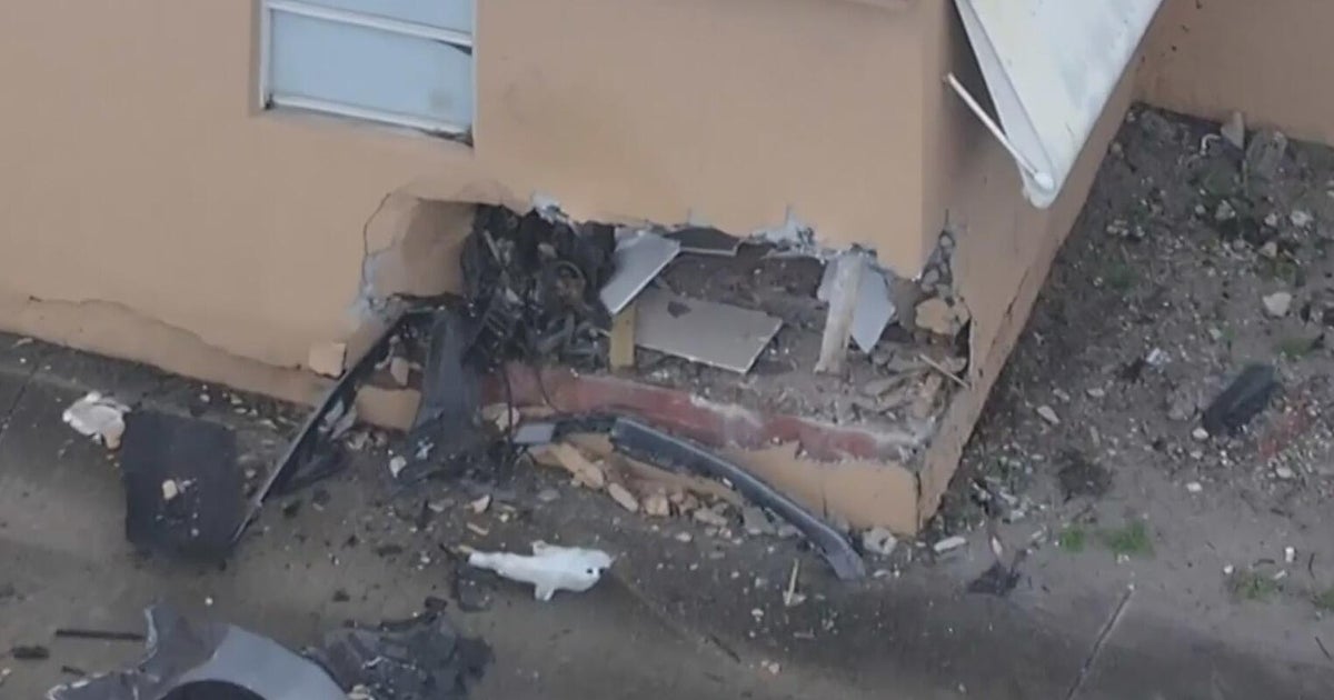 Car crashes into Miami-Dade apartment building, leaving gaping hole and structure deemed uninhabitable