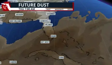 Map shows a haze of brown Saharan dust, which can suppress storms and increase heat.