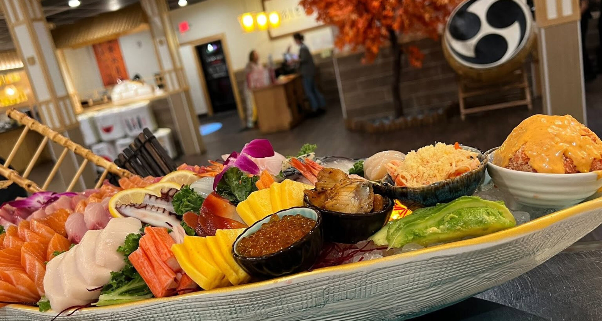 a platter of Asian food at Sushi Yama