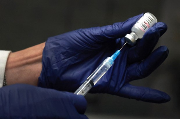 Pharmacist Dr.Nellie Simkin Zeltsman with Nova Southeastern University, compounding medication in an aseptic environment at the university pharmacy in Davie on Friday, August 21, 2026. (Carline Jean/South Florida Sun Sentinel)