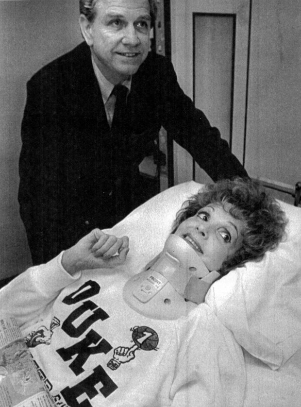 U.S. Sen. Paula Hawkins was severely injured in a studio mishap at WESH-Channel 2 in 1982. She is seen here with her husband Gene while recovering from lower back surgery at Duke University Medical Center in 1986.(UPI)
