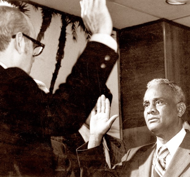 Arthur "Pappy" Kennedy takes the Orlando City Council oath of office in 1973. Kennedy was the first African American elected to the city council, more than two decades after Blacks were allowed to vote in city elections. (Orlando Sentinel file)