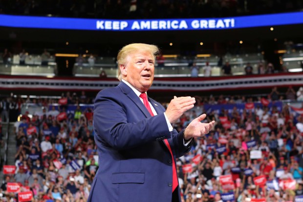 President Donald Trump responds to cheering supporters as he kicks off his reelection campaign at the Amway Center in Orlando in 2019. (Joe Burbank/Orlando Sentinel file)