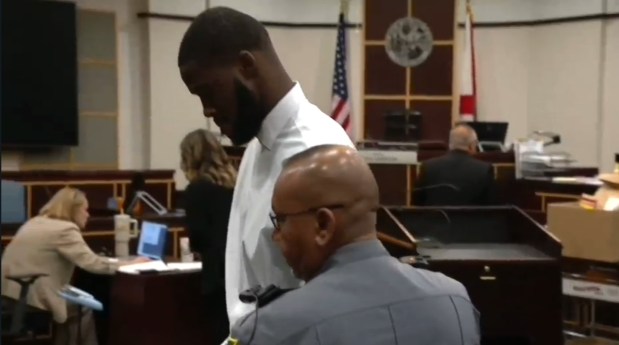 Jaylen Edgar, the teen tried for the Halloween mass shooting in 2024 in downtown Orlando that killed two and injured several others, is led out of the courtroom after being found guilty of all charges, including first-degree murder, by a jury on Monday, Aug. 24, 2026. (Spectrum News 13)