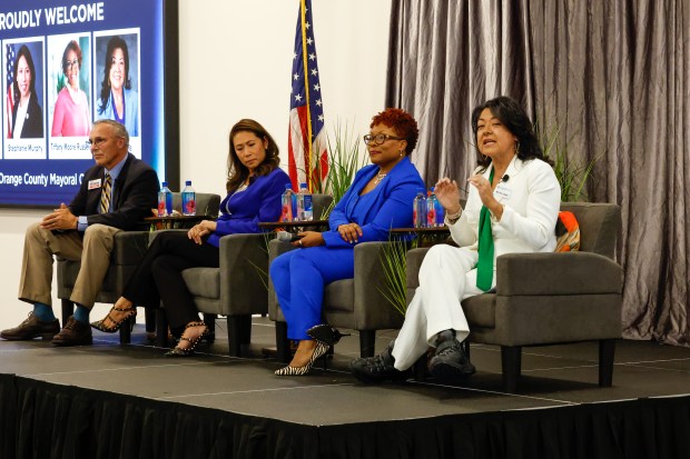 Orange County mayoral candidates, from left, Chris Messina, Stephanie Murphy, Tiffany Moore Russell and Mayra Uribe participate in a debate hosted by the Tiger Bay Club of Central Florida on Friday, July 31, 2026, at the Orlando Regional Realtor Association headquarters in Orlando. (Rich Pope/Orlando Sentinel)
