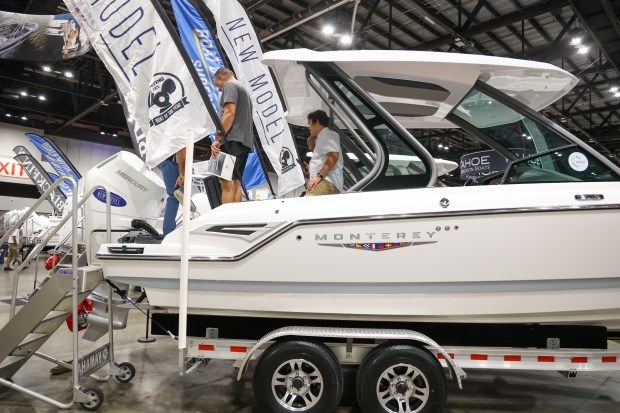 A Monerey Elite 30 gets an up close look over by some attendee to the Orlando Boat Show on Friday, April 4, 2025. The show, running now through Sunday, features 600 boats from more than 80 manufacturers and showcases some of the newest features and boating trends. Daily entry to the event is $10 for adults and free for kids 12 and under. (Rich Pope, Orlando Sentinel)