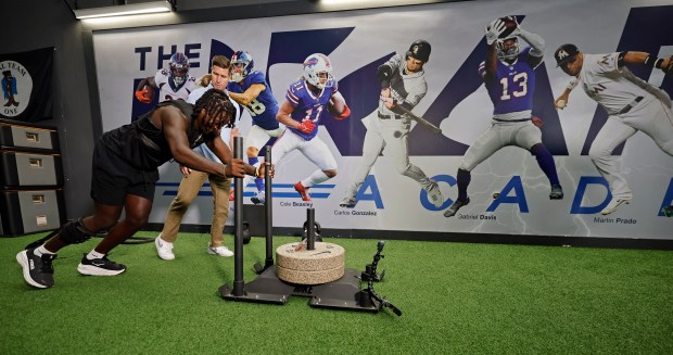 Former FSU linebacker Ethan Pritchard works out with physical therapist Alex Mendez at The Draft Academy on Friday, Aug. 28, 2026. Pritchard was shot in the head in an incident near Tallahassee last year. He is recovering and will walk on the field for the FSU opener on Saturday night. (Ricardo Ramirez Buxeda/ Orlando Sentinel)
