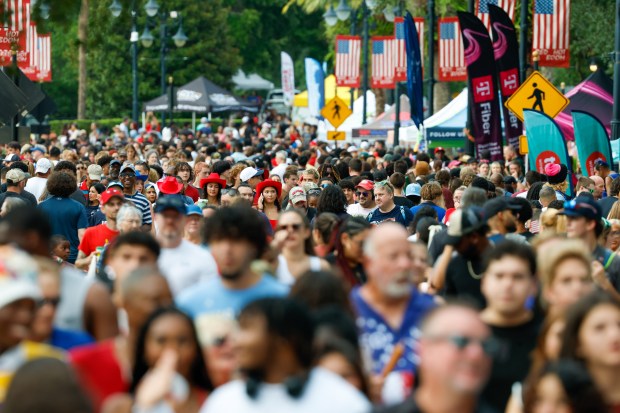 Red, Hot and Boom attendees wander through Cranes Roost Park before the fireworks display on July 3, 2026. (Rich Pope/Orlando Sentinel)