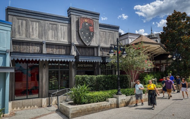People walk past Six Ravens, the newest outpost in the Gideon's Bakehouse family. (Ricardo Ramirez Buxeda/ OrlandoSentinel)