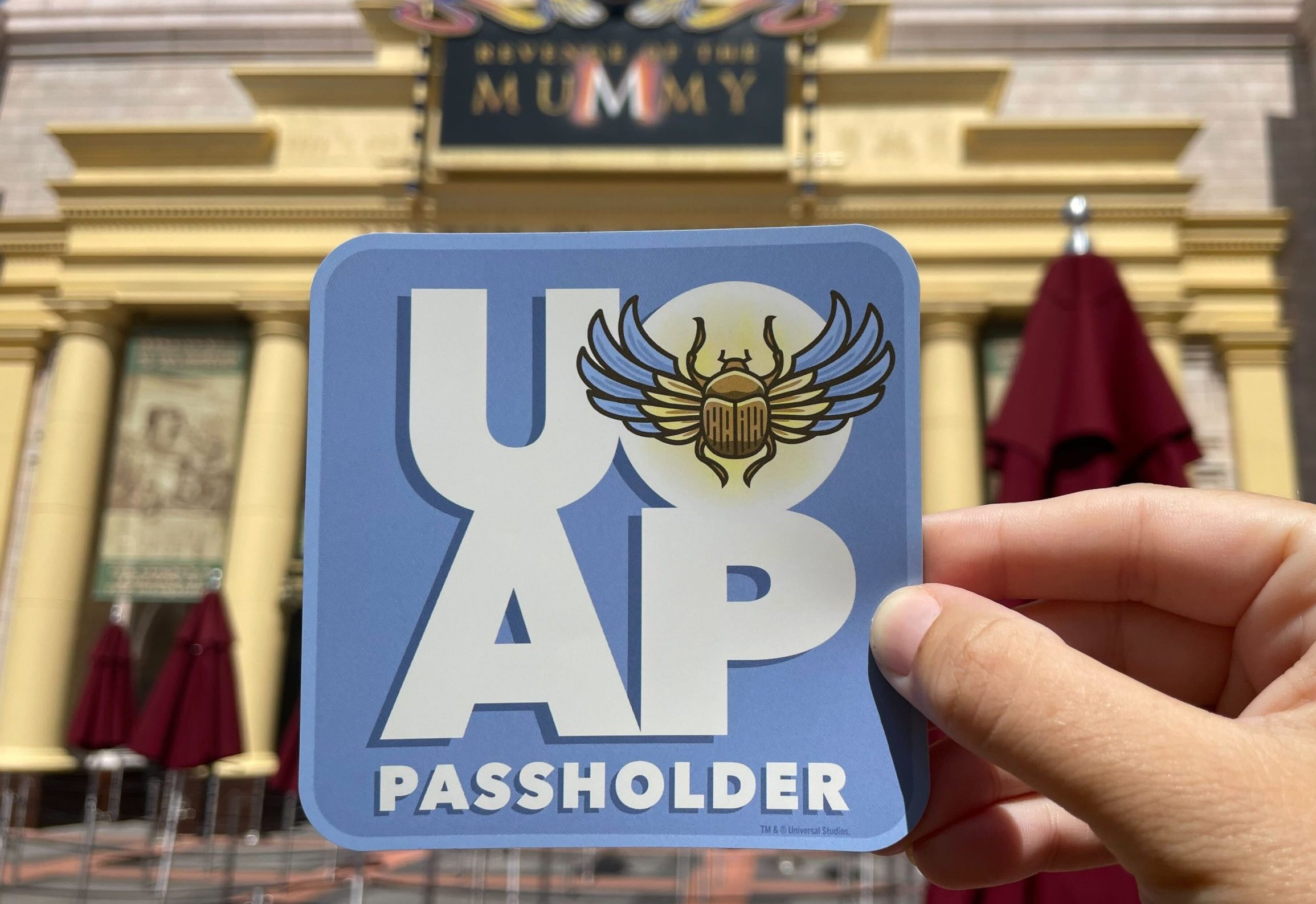 In 2022, Universal released another Revenge of the Mummy Passholder magnet featuring a blue background, white UOAP lettering, and a scarab incorporated into the logo.