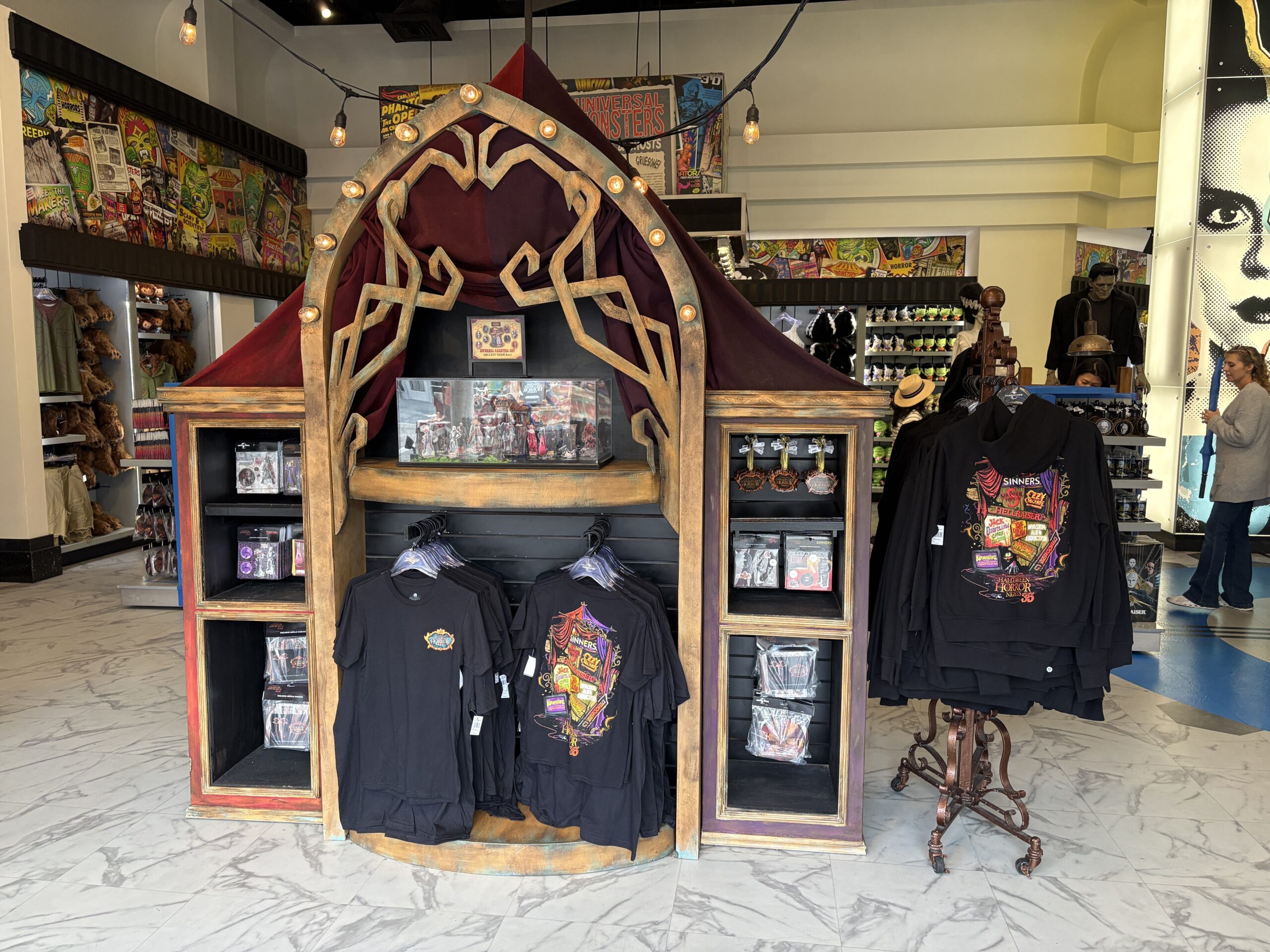 Halloween Horror Nights 35 merchandise featuring the event's logo and imagery from all of the houses is now available at Universal Orlando Resort. This merchandise can be found in Five & Dime in the Hollywood section of Universal Studios Florida.