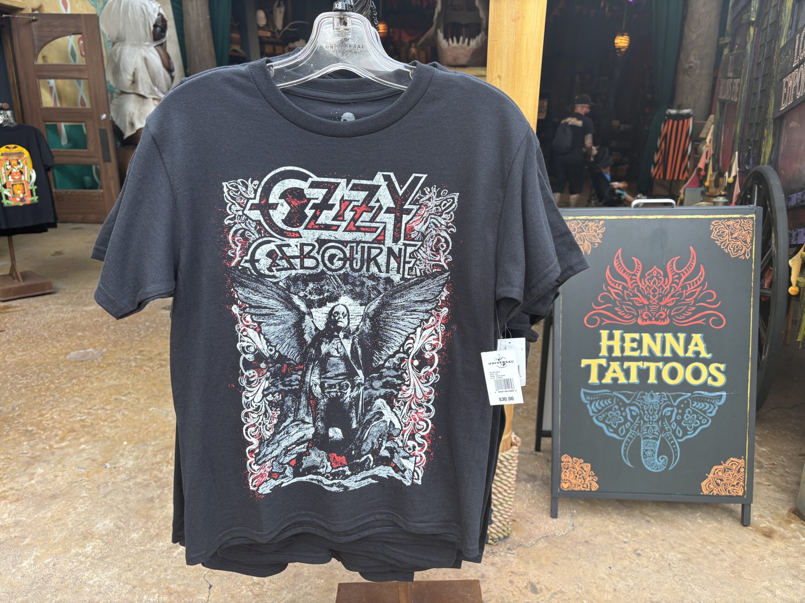 The black T-shirt has a stylized