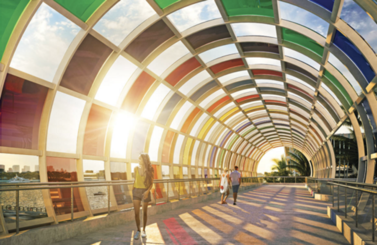The promised colorful pedestrian bridge was to provide residents of Five Park and other highrises on West Avenue. Developer says engineers hit permanent FPL electrical equipment when they began excavating