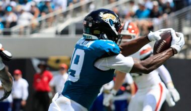 Jacksonville Jaguars wide receiver Josh Cameron (19) hauls in a touchdown reception against Cleveland Browns cornerback Denzel Ward (21) during the first quarter of an NFL football matchup at EverBank Stadium on Sunday, Sept. 13, 2026, in Jacksonville, Fla. The Jaguars defeated the Browns 34-10.