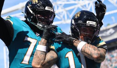 Sep 27, 2026; Jacksonville, Florida, USA;  Jacksonville Jaguars wide receiver Parker Washington (11) and offensive lineman Cole Van Lanen (70) celebrate a touchdown that was called back during the third quarter against the New England Patriots at EverBank Stadium.