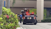 A Florida International University motorman arrives at the hospital after he was injured in a crash in Doral on Friday, officials said.
