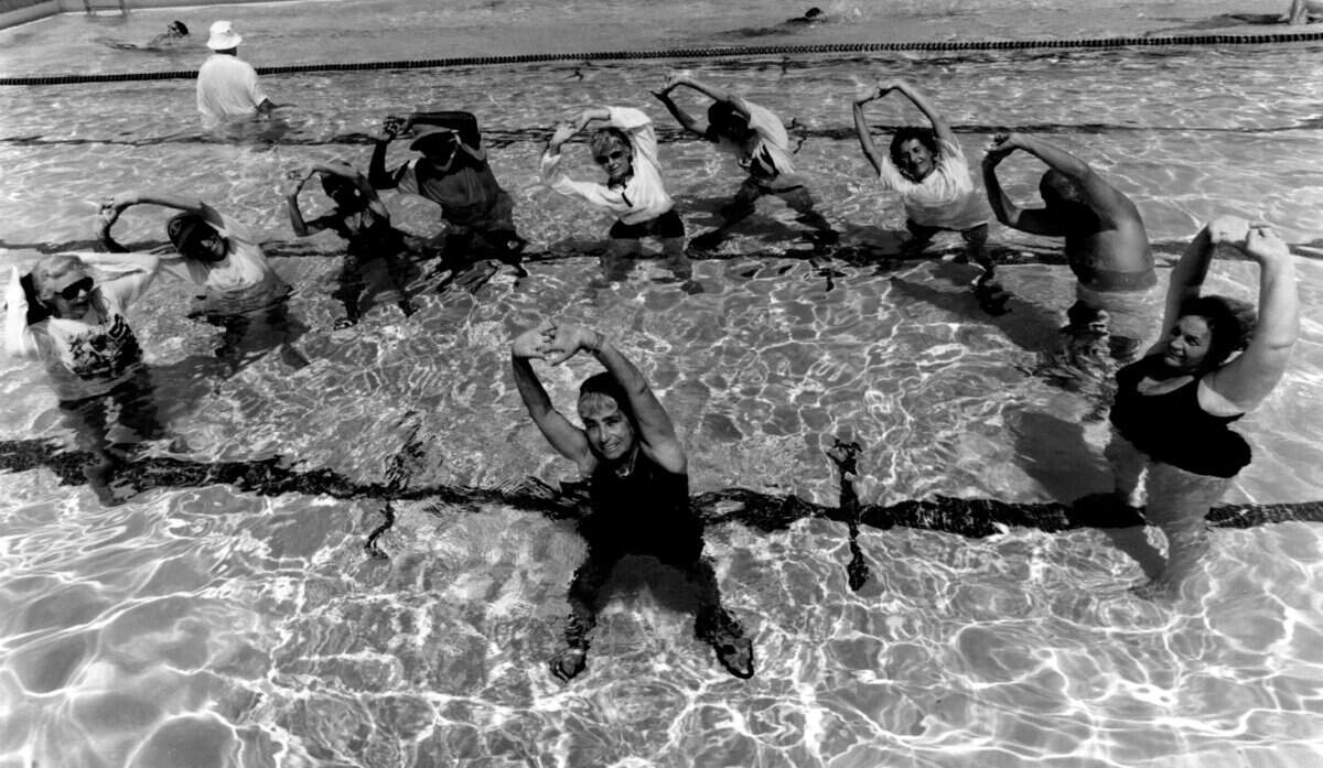Lorne Salzer instructs a water-walking class at the Miami shores pool.