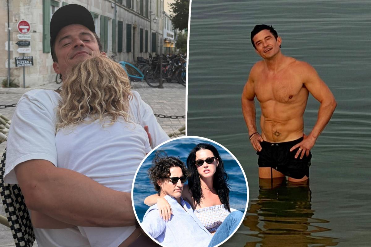 Orlando Bloom shows off washboard abs on vacation with daughter Daisy Dove