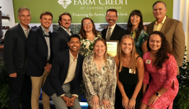 Patrick Prussing (back row, third from right) holds his Gene A. Batson Award while posing with luncheon attendees Aug. 27 at Highland Manor in Apopka. The award recognizes outstanding service and leadership in the Action Chapter of the Florida Nursery, Growers and Landscape Association.