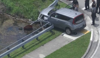 Driver crashes into guardrail at canal in Davie
