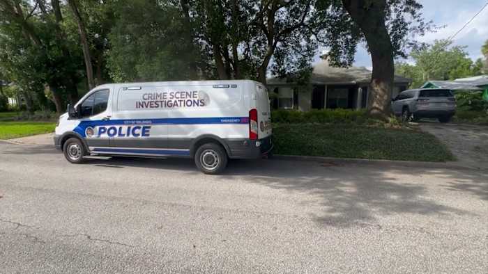Orlando police crime scene investigators return to same downtown home for second day