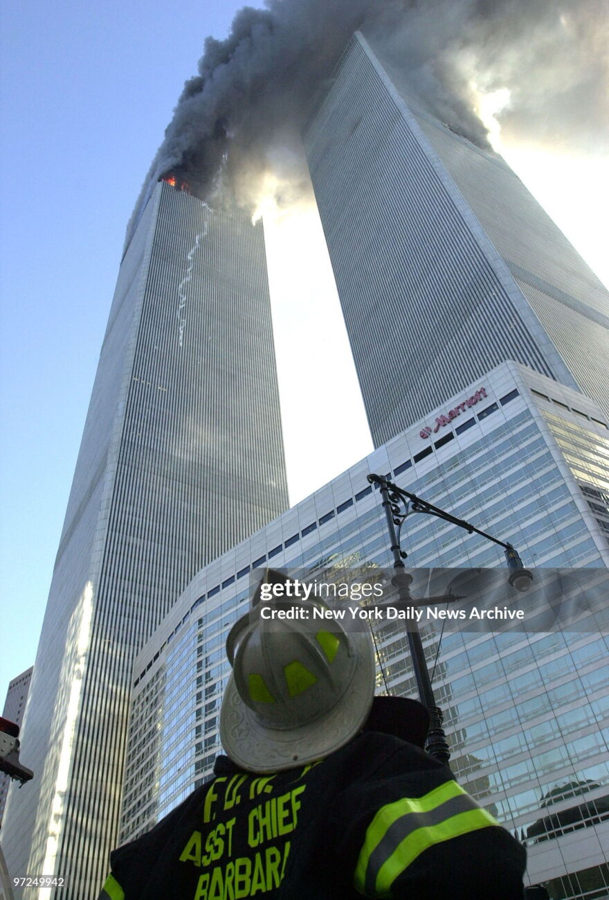 NY Daily News photographer David Handsschuuh took this now-famous photo of Assistant New York City Fire Chief Gerard A. Barbara moments after Barbara sent Chuck Diaz to the rear of the South Tower.