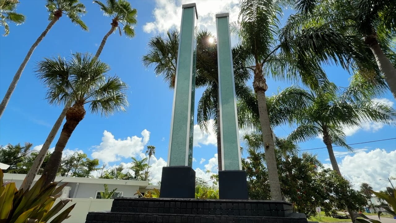 The Twin Towers Memorial at Friendship Park in Redington Beach features two glass columns representing the World Trade Center towers. They sit on a Pentagon-shaped base. Chips of broken glass signify the broken hearts of the American people.