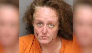 Woman charged after allegedly setting stranger on fire at gas station