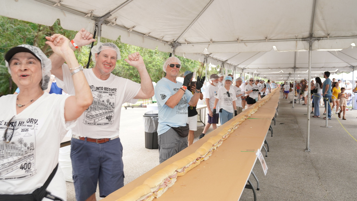 200 registered volunteers came together to help build the record-breaking 400-foot Cuban sandwich during House of Hope’s Bite Into History event. 200 registered volunteers came together to help build the record-breaking 400-foot Cuban sandwich during House of Hope’s Bite Into History event.